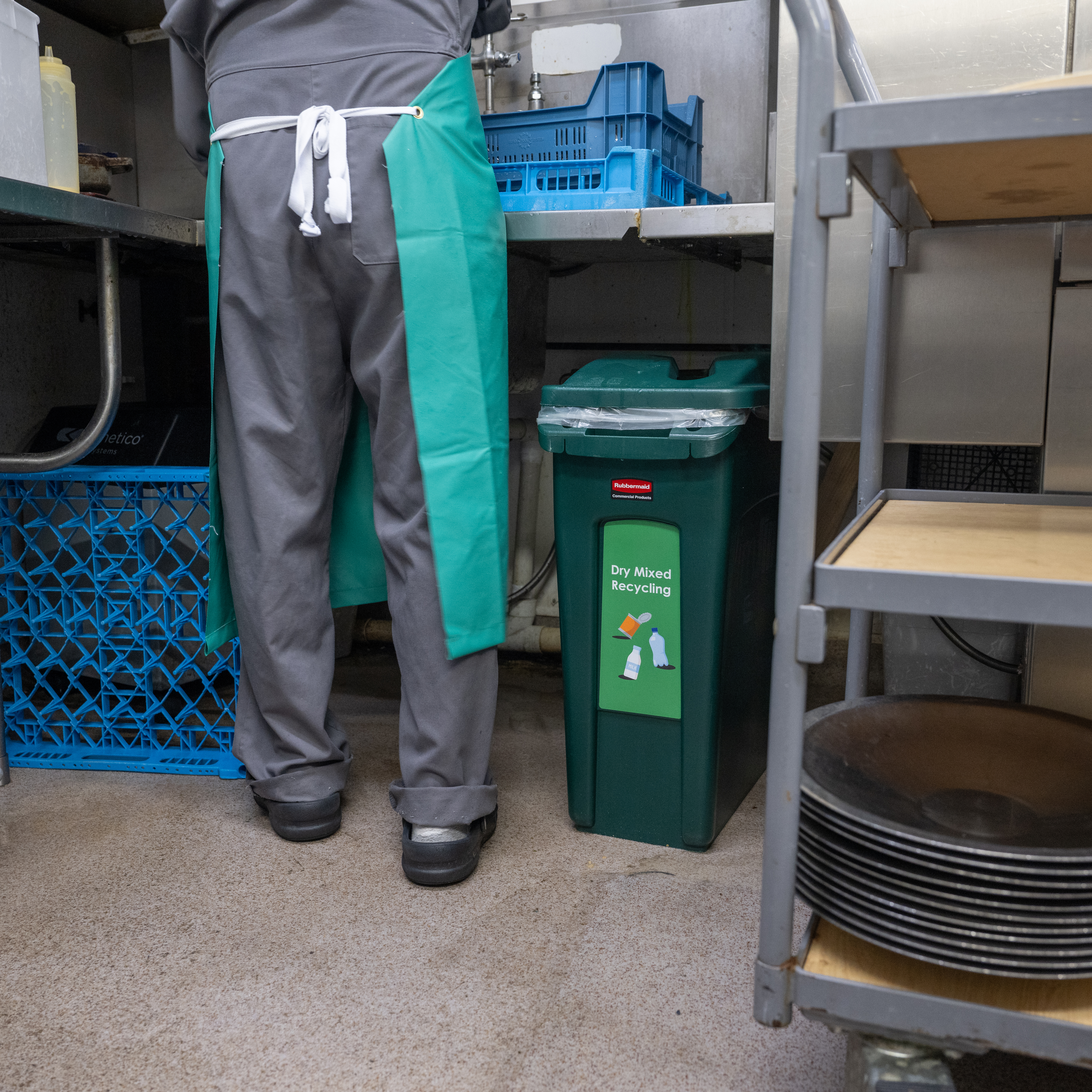 Slim Jim bin under a commercial kitchen counter